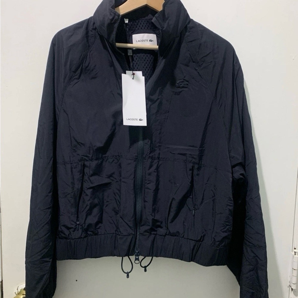 NEW Lacoste Izod Women’s Jacket Full Zip Navy Blue nylon Windbreaker Stow Hood